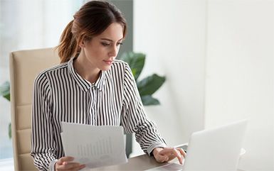 Westborough Payroll Service Woman Doing Paperwork